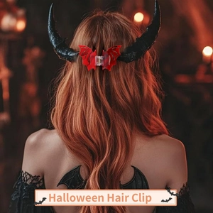Detail of red bat wing hair clip worn on back of head for Halloween party hair styling