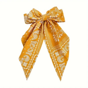 Bohemian mustard yellow paisley bow hair clip with long flowing ribbon streamers