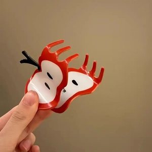 Creative red apple hair claw clip with glossy finish for sweet ponytail styling