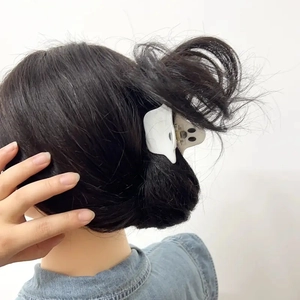 Glossy white ghost hair claw clip for Halloween hairstyles and festive hair styling