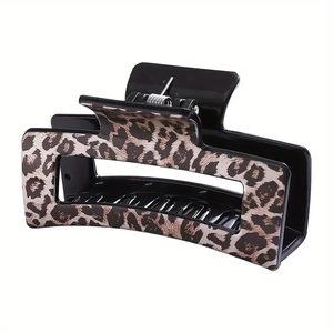 Rectangle leopard print hair claw clip in black and tan with strong metal spring