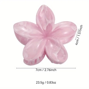 Pink frangipani flower hair claw clip in marble acetate finish with 7cm size dimensions