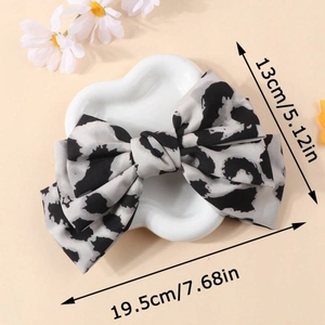 Pince à cheveux nœud élégante avec motif léopard noir et blanc, mesure 19,5 cm