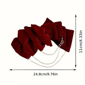 Barrette nœud géante en velours rouge avec chaînes de perles et détails de dimensions