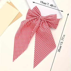 Detail of red and white checkered bow hair clip showing dimensions 19cm by 35cm