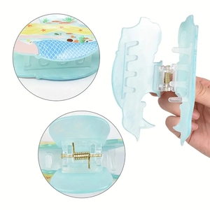 Cartoon mermaid hair claw clip in light blue acrylic with anti-slip grip for women