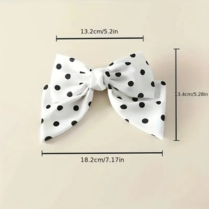 Polka dot bow hair clip with spring fastener measuring 13.2cm for sweet vintage styling