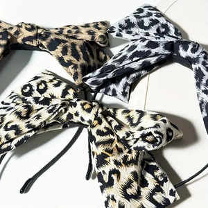 Set of leopard and zebra print bow headbands with stylish animal patterns for women