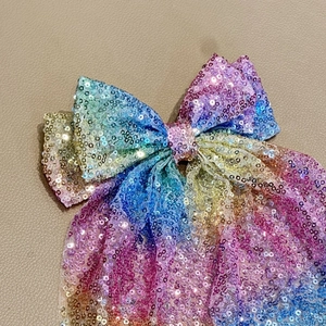 Barrette à cheveux nœud à paillettes irisées style sirène avec rubans colorés