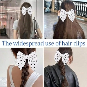 Detailed views of a large white fabric hair clip with black polka dots on various hairstyles