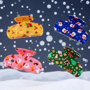 Set mit vier perlmuttfarbenen Weihnachts-Haarklammern mit Weihnachtsmann und Schneemann