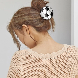 3D soccer ball hair claw clip with black and white pattern for athletic hairstyles