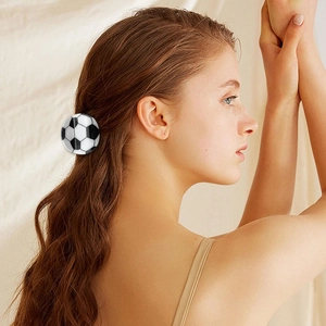 Cute soccer ball hair claw clip for women featuring classic black and white sports design