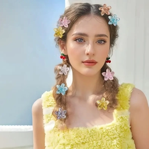 Sweet 4cm frangipani hair claw clips in pastel resin for vacation and beach hairstyles