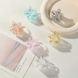 Set of six colorful 4cm frangipani hair claws in matte pastel acrylic for elegant styling