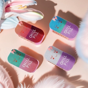 Set of 4 creative pill shaped hair claws with glitter finish and Chill Pill cartoon design