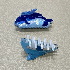 Cute blue whale hair claw clips with iridescent pearl finish and sturdy shark clip grip