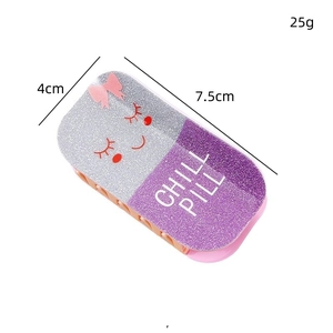 Glittery pill-shaped hair claw clip with Chill Pill design and smiley face icon