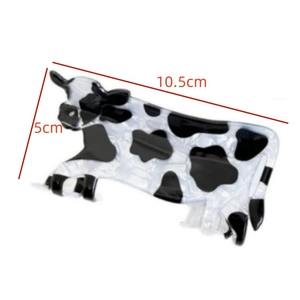 Molla per capelli a forma di mucca in acrilico bianco e nero con misure di 10,5 cm