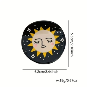 Black round hair claw clip with vintage sun and moon face print in star pattern