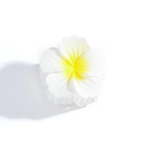 Elegant white plumeria flower hair claw clip with yellow center on white background
