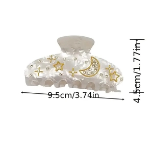 Acrylic hair claw clip with star and moon rhinestone design in marble white and gold