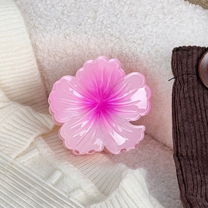 Detail of 8cm gradient pink resin flower hair claw clip with translucent crystal texture