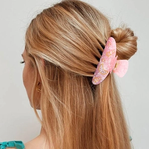 Elegant pink acrylic hair claw clip with gold star moon pattern and sparkling rhinestones