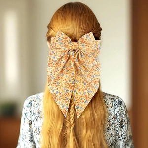 Barrette à cheveux nœud floral avec longs rubans pour coiffure tressée style bohème