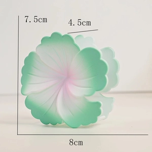 Vue détaillée des dimensions d'une pince à cheveux fleur de frangipanier mate dégradée