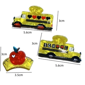 Miniature school bus and red apple hair claw clips set in yellow and red acrylic