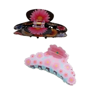 Vintage floral hair claws with colorful flower patterns and wavy edge design on white background