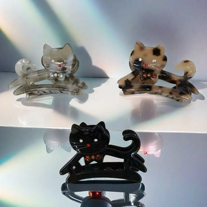 Pinces à cheveux chat serties de diamants en écaille et gris fumé pour coiffures élégantes