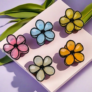 Set of five colorful cream jelly flower hair claws in pink blue yellow and white tones