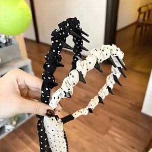 Serre-têtes à pois noir et blanc avec dents antidérapantes pour un style rétro