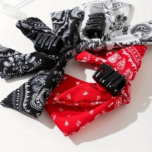 Three-piece set of large paisley print bow hair claws in red, white, and black colors