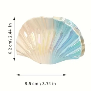 Detailed view of iridescent shell hair claw clip with size measurements in centimeters