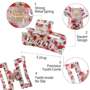 Detail of square hair claw clip with cherry print, strong metal spring and non-slip teeth