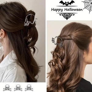 Halloween hollow skull metal hair claw clip in punk style shown on models with silver finish