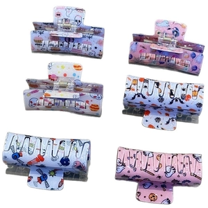 Set of 6 colorful Halloween and space themed rectangular hair claw clips for women