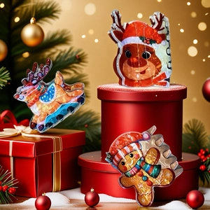Christmas hair claw clip set with cute reindeer and gingerbread man designs for party