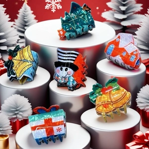 Christmas hair claw clips set featuring Santa, snow house, and bell motifs on white stands