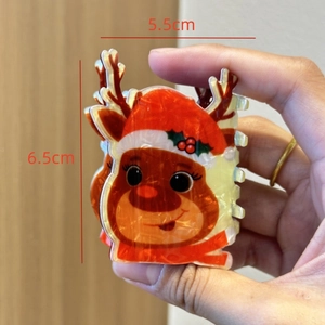 Detail showing the 5.5cm by 6.5cm dimensions of the reindeer claw clip for hair