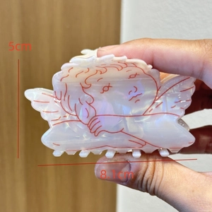Charming iridescent Cupid angel wing hair claw clip for women, size 8.1cm x 5cm