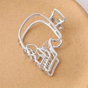 Polished silver hollow skull hair claw clip with punk style metal shark clip design