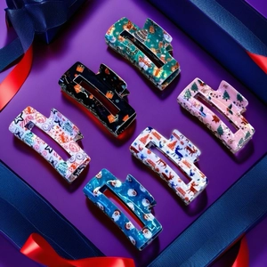 Détails des pinces à cheveux de Noël avec motifs de renne et du Père Noël en coffret