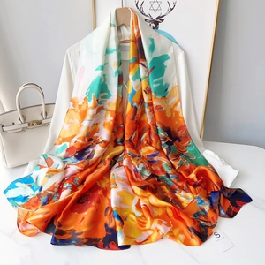 Artistic oil painting style silk scarf with vibrant orange and blue patterns