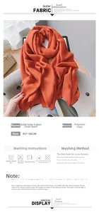 Detailed chart showing orange polyester scarf dimensions 85x180cm and washing instructions