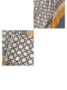 Detail of linen-feel shawl scarf showing geometric patterns and fine edge stitching