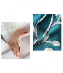 Close-up of beige rose floral print silk scarf with exquisite rolled edge stitching